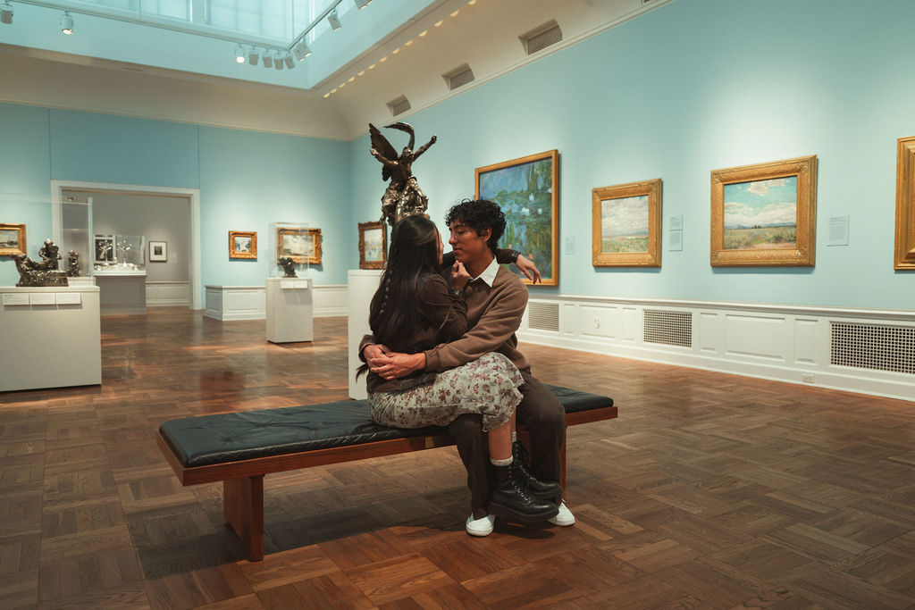 Couple embraces at their Portland Art Museum engagement photoshoot